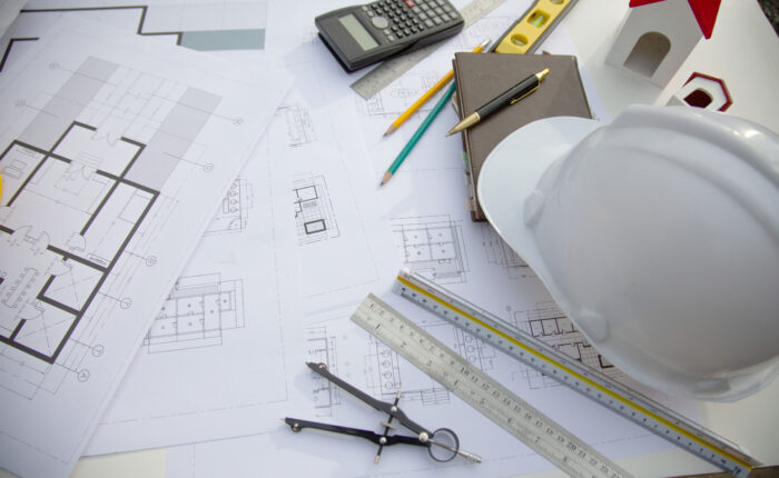 Desk of Architectural working project in construction site,With
